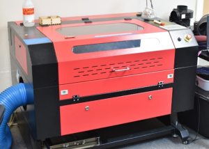 Photo of Big Red, a laser cutting/engraving machine